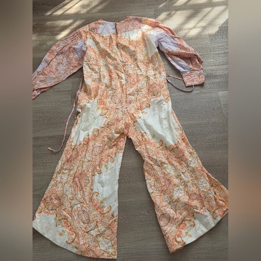 This is a Free People Blooming Fields wide-legged jumpsuit with a paisley bohemi - Picture 4 of 10